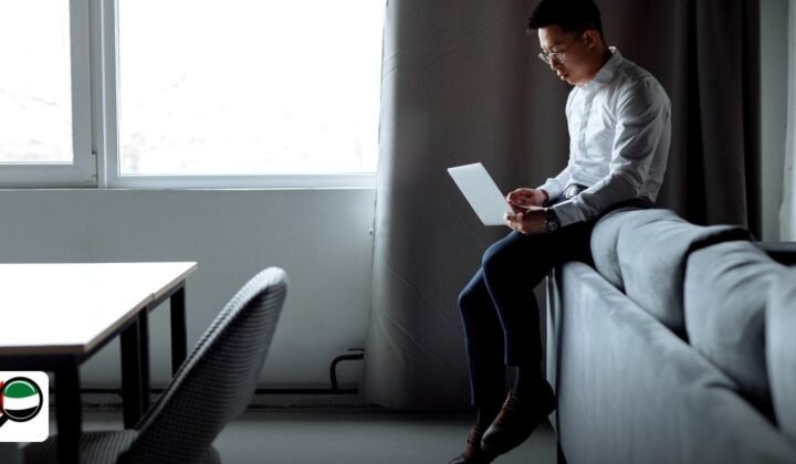 Medical Test for UAE Free Zone Visa: Step-by-Step Guide - business professional focused on work using a laptop indoors
