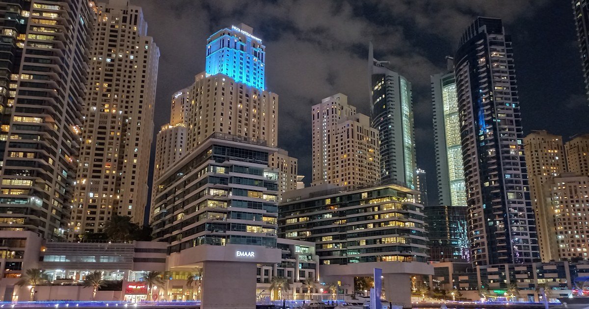 Dubai Marina at night - UAE free zone costs by nationality