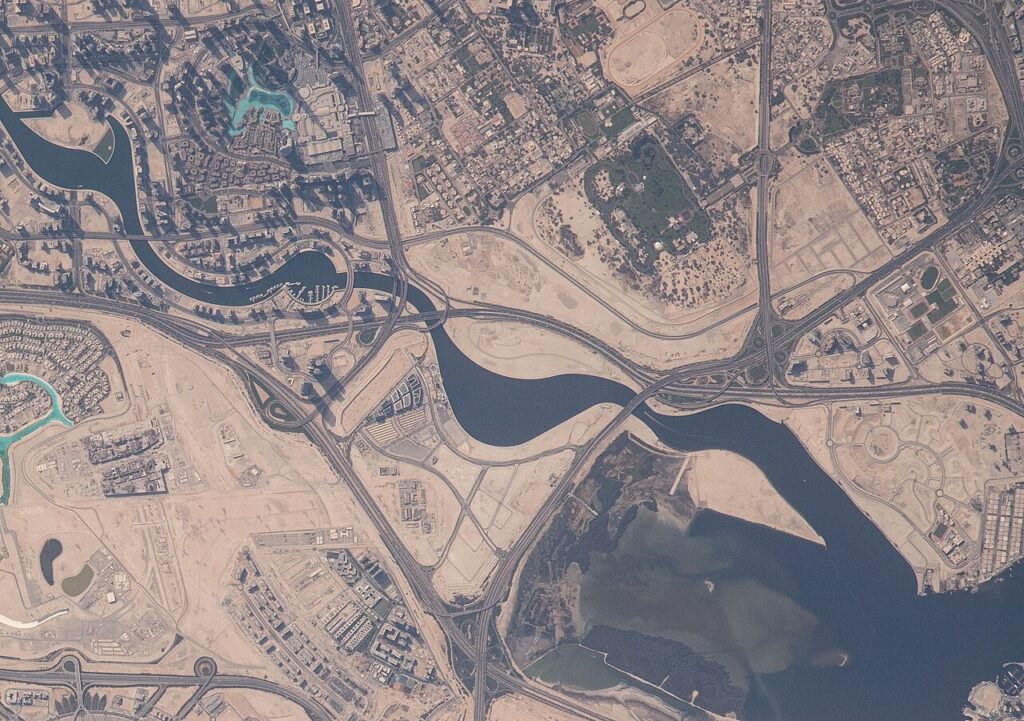 Aerial view of Dubai Business Bay and the Dubai Water Canal, a mainland commercial district requiring a DET trade licence