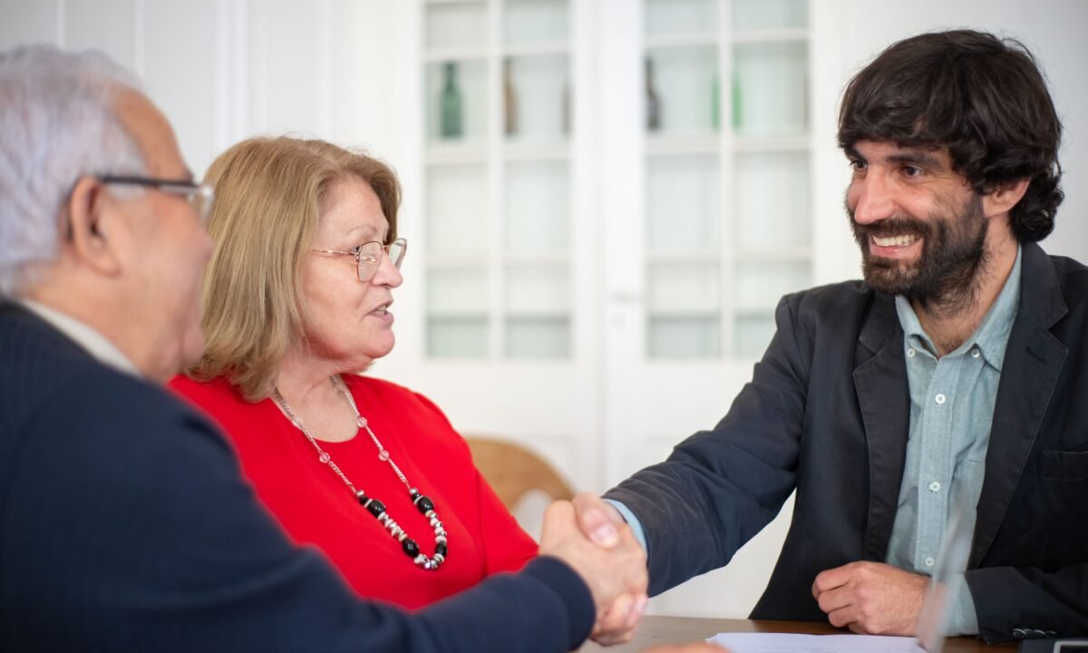 Management consultants shaking hands during a business meeting in the UAE