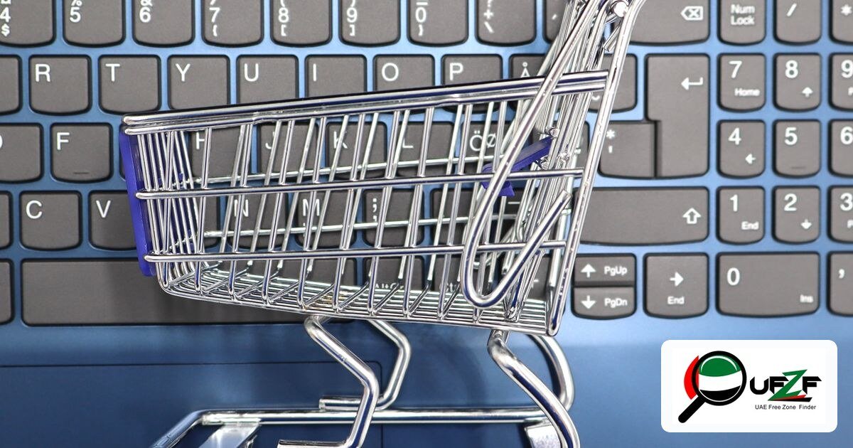 UAE free zone e-commerce business setup 2026 — miniature shopping cart on laptop keyboard