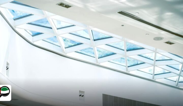 Dubai World Trade Centre Office & Flexi-desk Cost 2026 - bright modern interior with a striking glass ceiling and sleek