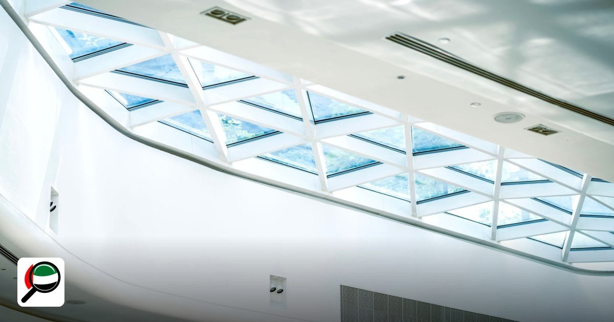 Dubai World Trade Centre Office & Flexi-desk Cost 2026 - bright modern interior with a striking glass ceiling and sleek