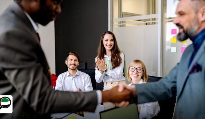 Gold & Diamond Park Cheapest Package with Visa 2026 - colleagues in an office cheer as two team members finalize