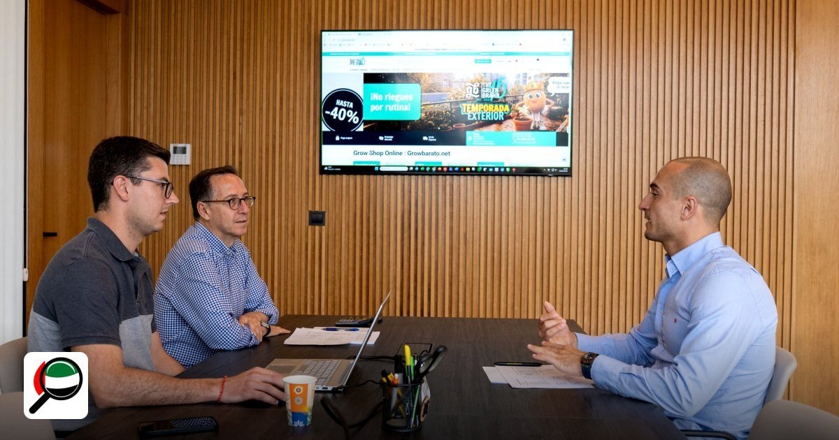 Gold & Diamond Park Corporate Tax & 0% QFZP Rules 2026 - three professionals in a office engaged in a business meeting